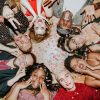 Group of friends lying on the floor at a party