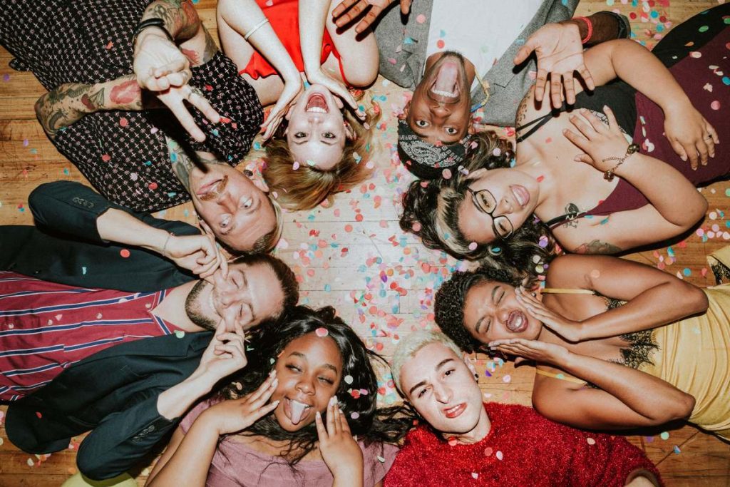 Group of friends lying on the floor at a party