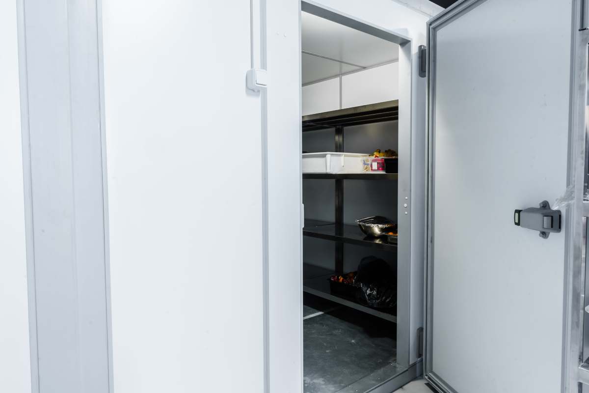Refrigerator room door in professional kitchen in restaurant close up