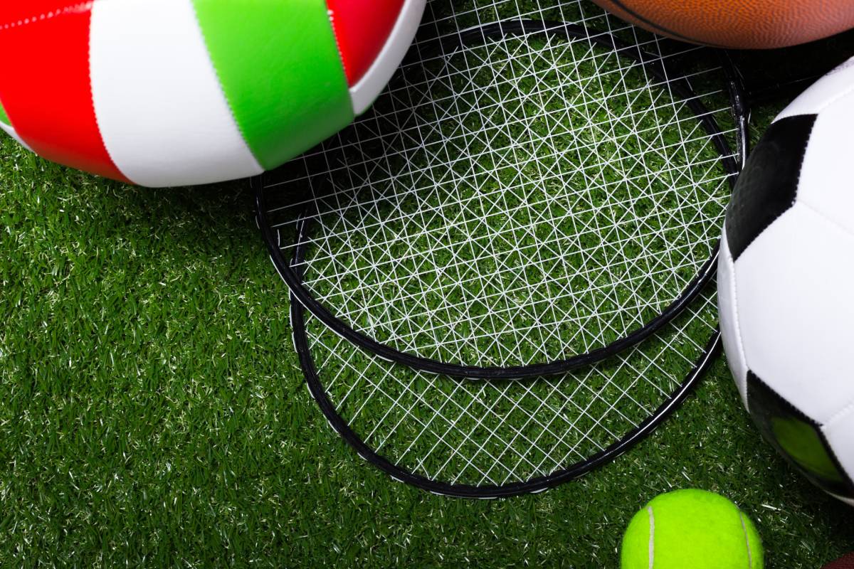 Various sport tools on grass